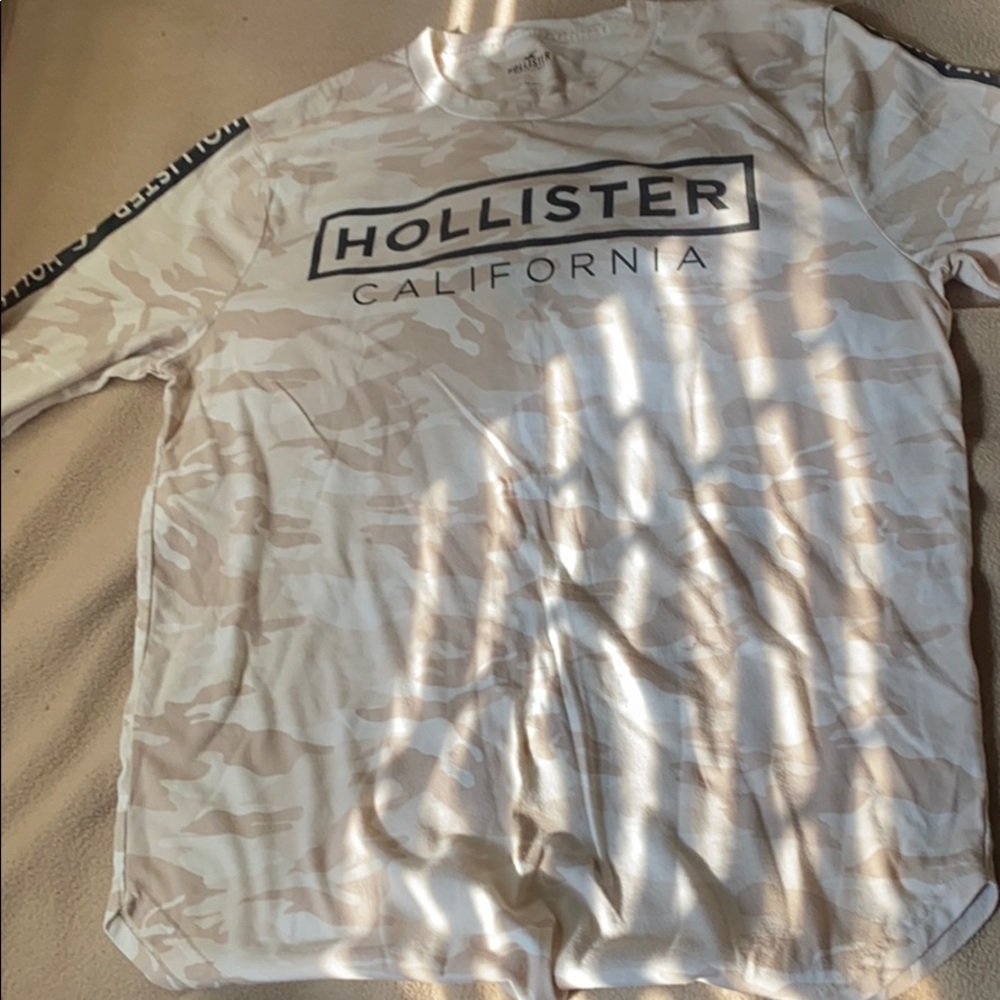 A light creme camouflage long sleeve shirt